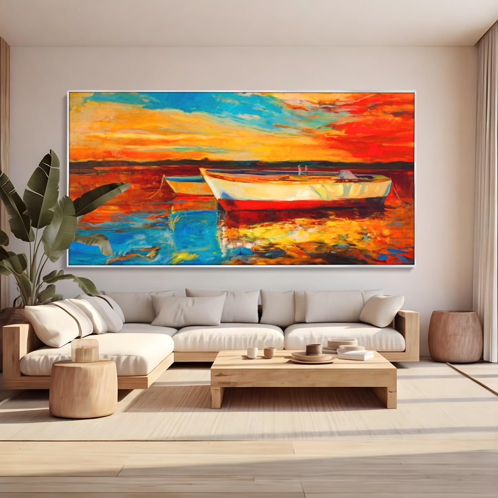 Tablou canvas cu pictura cu barci la apus, in rama de aluminiu argintiu, pe perete intr-un living